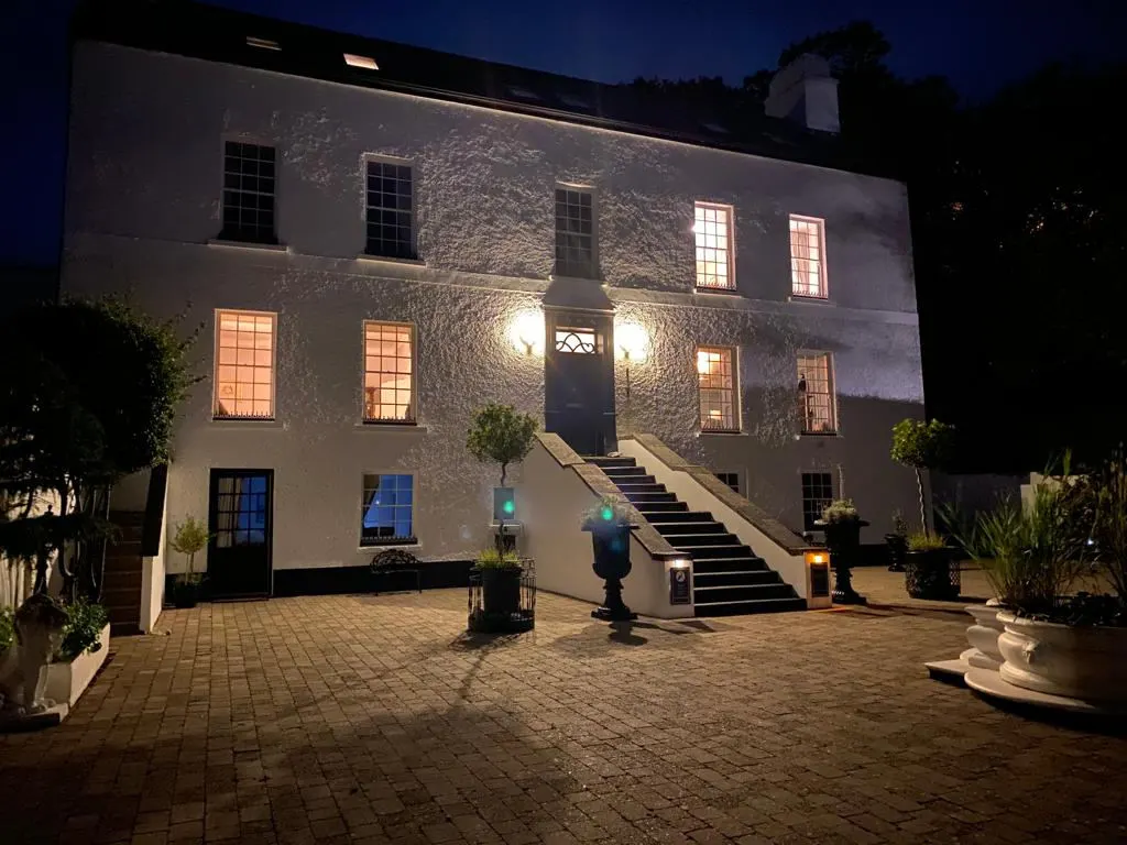Barrow House lit up at night