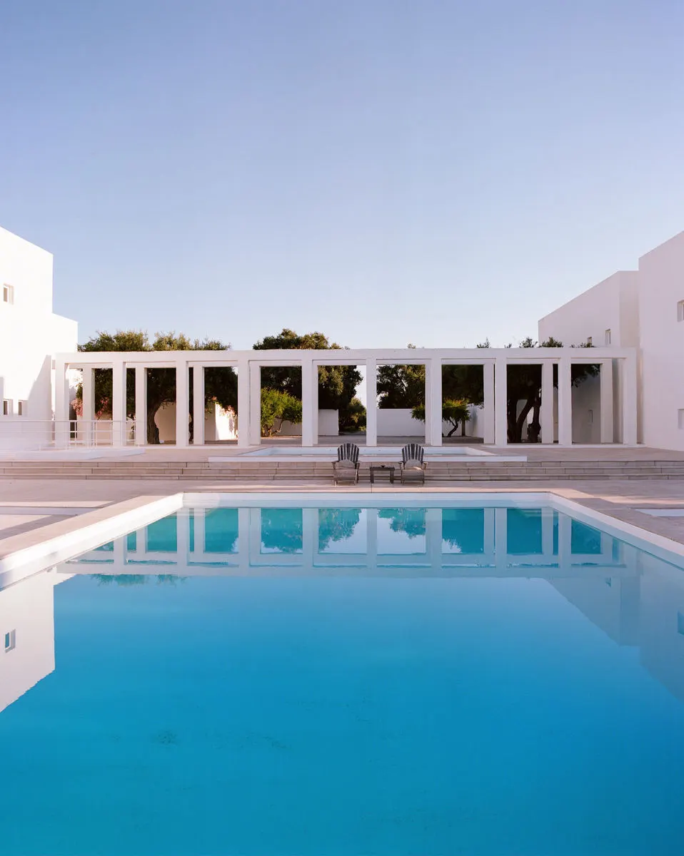 The long pool between white walls